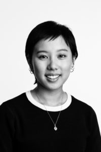 Black and white headshot of businesswoman on white background