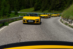 Yellow Audi R8 Spyders driving through the Dolomites during the Audi R8 Spyder European Tour