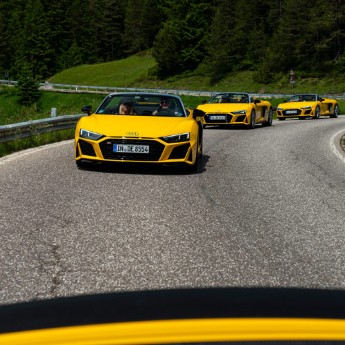 Yellow Audi R8 Spyders driving through the Dolomites during the Audi R8 Spyder European Tour