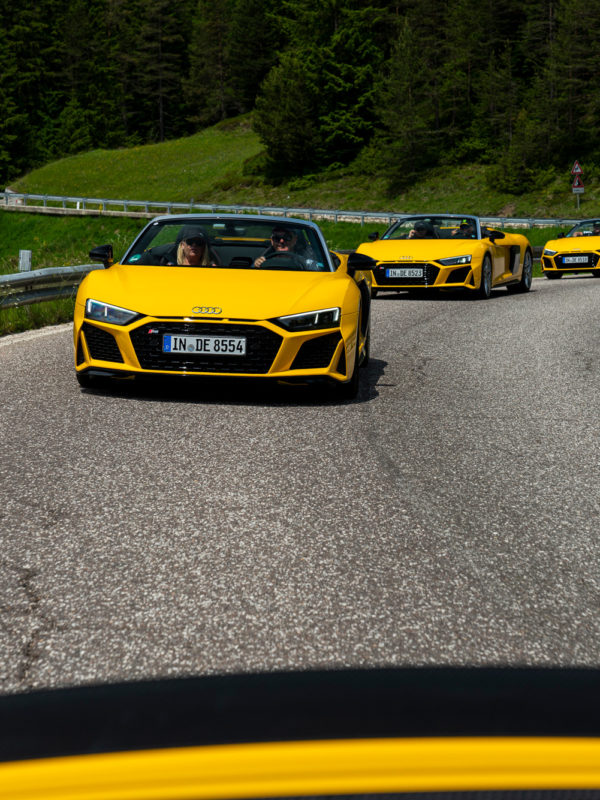 Yellow Audi R8 Spyders driving through the Dolomites during the Audi R8 Spyder European Tour