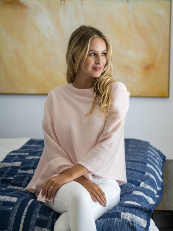 Fashion photography for Esperance and Co shot on location in Palm Beach, NSW, Australia showing cashmere topper in colour Dawn Pink