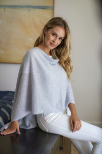 Fashion photography for Esperance and Co shot on location in Palm Beach, NSW, Australia showing cashmere topper in colour Periwinkle